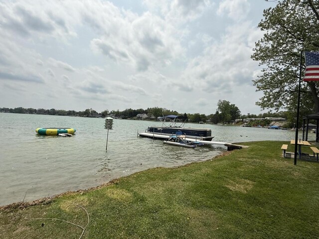 11108 Silver Lake Rd, South Lyon, MI 48178 - dock with a water view and a yard