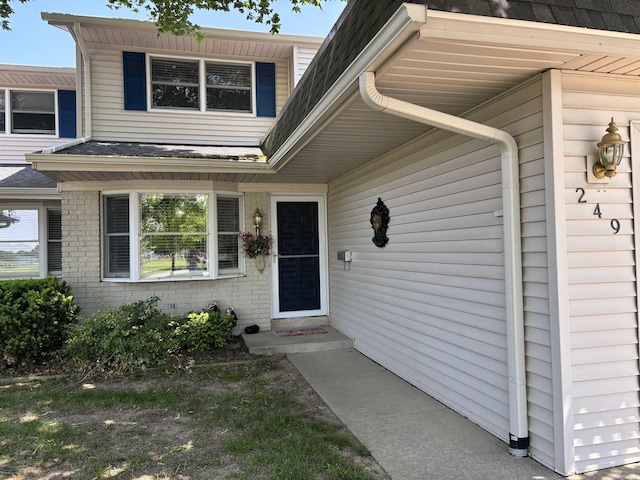 249 Churchgrove Rd, Frankenmuth, MI 48734 - view of exterior entry with brick siding
