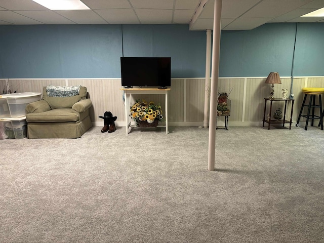 249 Churchgrove Rd, Frankenmuth, MI 48734 - finished below grade area featuring a paneled ceiling, a wainscoted wall, and carpet floors