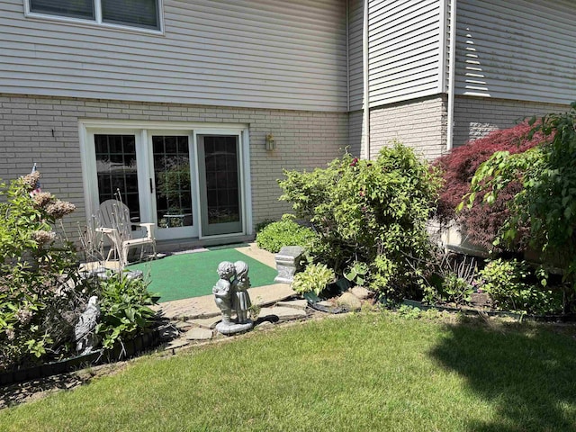 249 Churchgrove Rd, Frankenmuth, MI 48734 - view of grassy yard with a patio