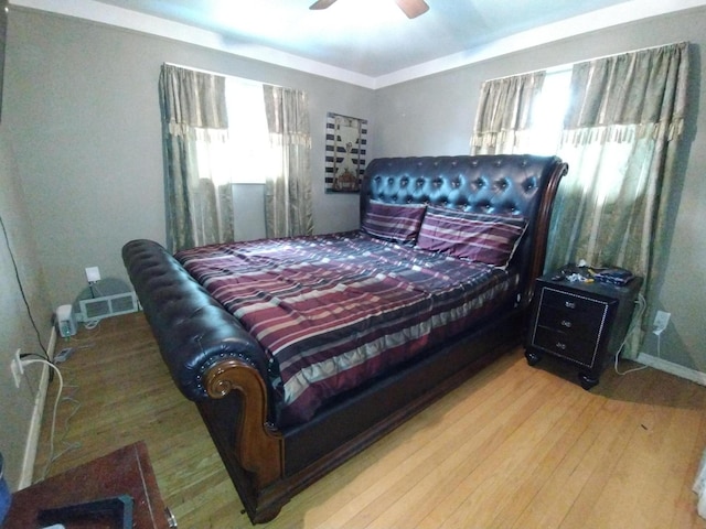 8383 Dixie Ln, Dearborn Heights, MI 48127 - bedroom with wood finished floors and a ceiling fan