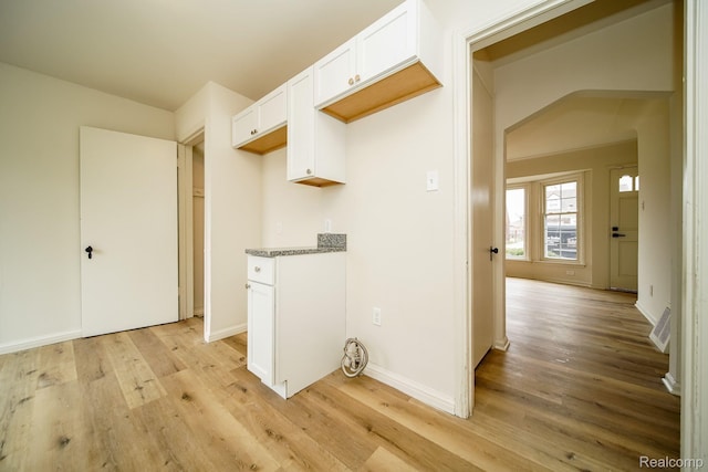 15400 Sprenger Ave, Eastpointe, MI 48021 - washroom with light wood-type flooring and baseboards