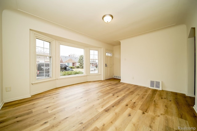 15400 Sprenger Ave, Eastpointe, MI 48021 - unfurnished room with wood finished floors and baseboards