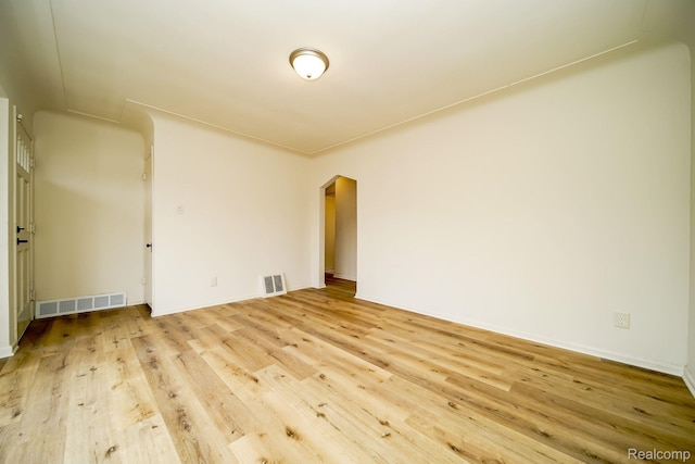 15400 Sprenger Ave, Eastpointe, MI 48021 - unfurnished room featuring wood finished floors and arched walkways