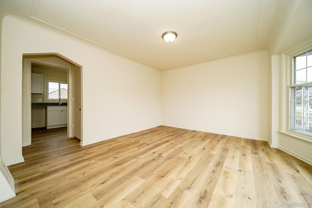 15400 Sprenger Ave, Eastpointe, MI 48021 - spare room featuring light wood-style flooring and a sink