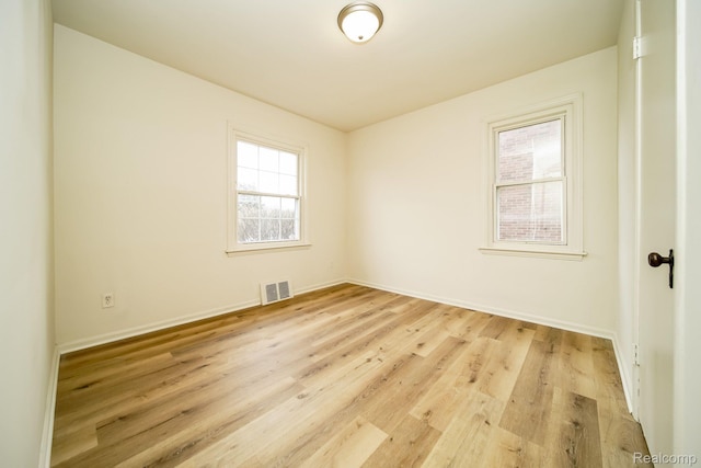15400 Sprenger Ave, Eastpointe, MI 48021 - unfurnished room featuring light wood-style flooring and baseboards