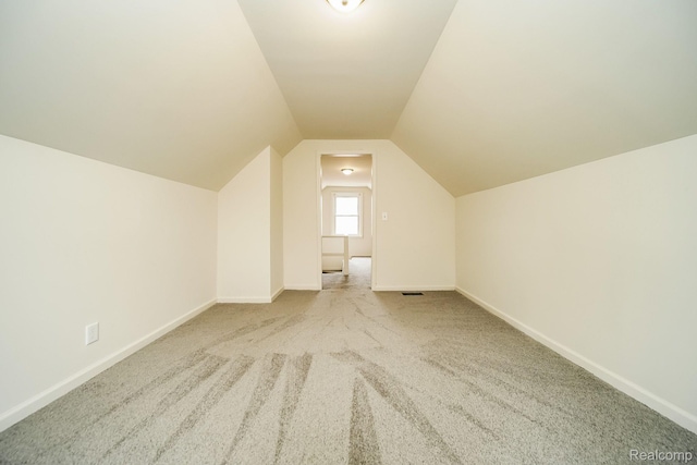 15400 Sprenger Ave, Eastpointe, MI 48021 - bonus room featuring carpet flooring, baseboards, and lofted ceiling
