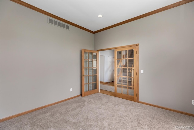 2479 Waterfront Dr, Brighton, MI 48114 - unfurnished room with french doors, ornamental molding, baseboards, carpet flooring, and recessed lighting