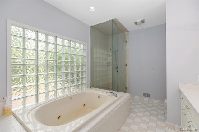 2479 Waterfront Dr, Brighton, MI 48114 - full bathroom featuring vanity, a tub with jets, and a tile shower