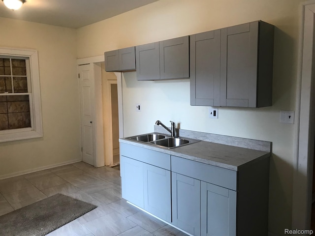 70 Colorado St, Highland Park, MI 48203 - kitchen featuring a sink and gray cabinets
