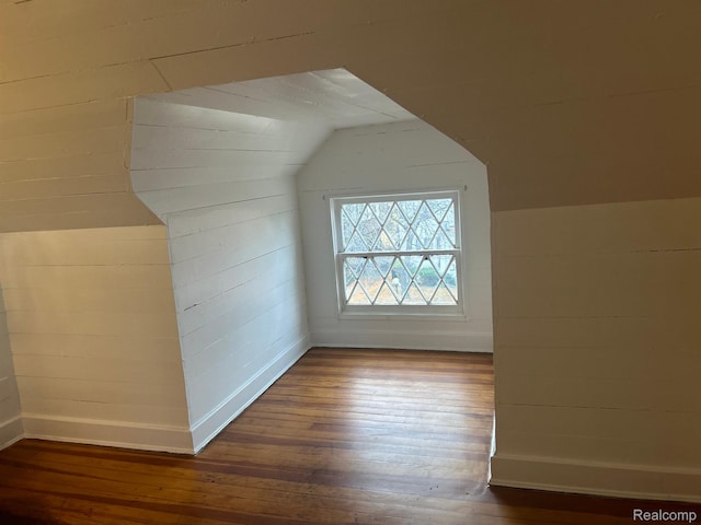 70 Colorado St, Highland Park, MI 48203 - additional living space with hardwood / wood-style flooring, lofted ceiling, and baseboards
