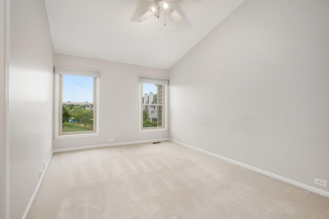 3451 Bent Trail Dr, Ann Arbor, MI 48108 - carpeted empty room with baseboards, lofted ceiling, and a ceiling fan