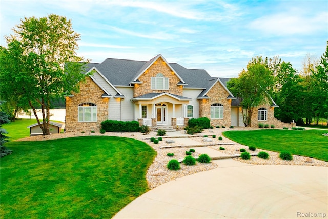 6312 S Graham Rd, Saint Charles, MI 48655 - craftsman house with stone siding and a front yard