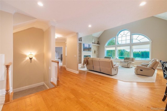 6312 S Graham Rd, Saint Charles, MI 48655 - living room featuring wood finished floors, recessed lighting, vaulted ceiling, and baseboards