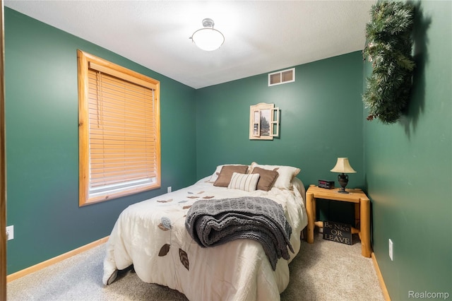 6312 S Graham Rd, Saint Charles, MI 48655 - carpeted bedroom featuring baseboards