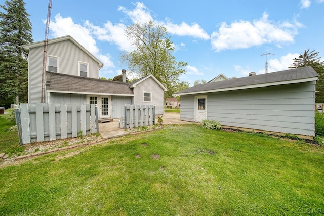 603 Company St, Adrian, MI 49221 - rear view of property with a yard