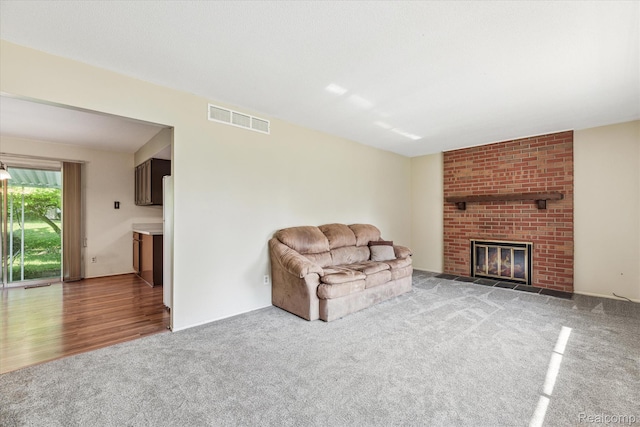 229 Hillview Ter, Fenton, MI 48430 - living area featuring carpet and a fireplace