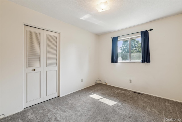 229 Hillview Ter, Fenton, MI 48430 - unfurnished bedroom with carpet floors and a closet