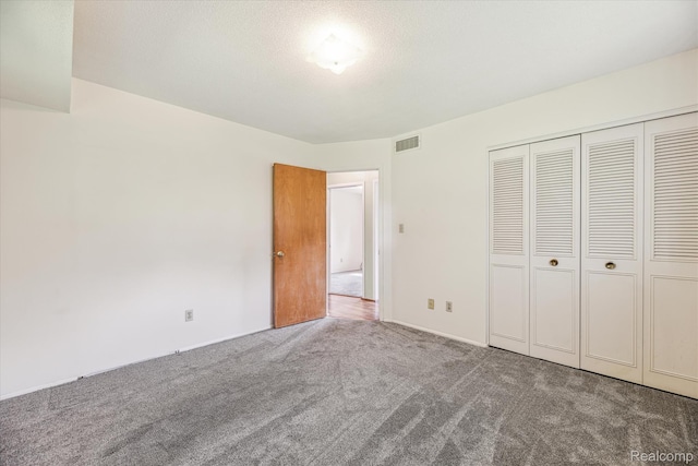 229 Hillview Ter, Fenton, MI 48430 - unfurnished bedroom featuring carpet and a closet
