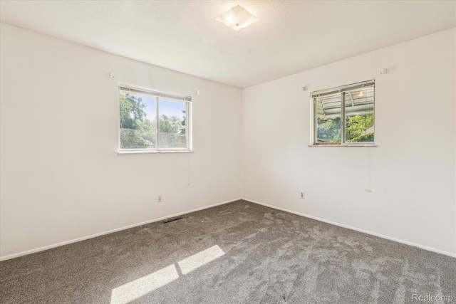 229 Hillview Ter, Fenton, MI 48430 - spare room with carpet flooring and baseboards