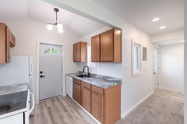 607 S Mill St, Saint Louis, MI 48880 - kitchen with brown cabinetry, a sink, white appliances, electric panel, and lofted ceiling