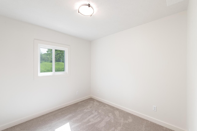 607 S Mill St, Saint Louis, MI 48880 - carpeted empty room with baseboards