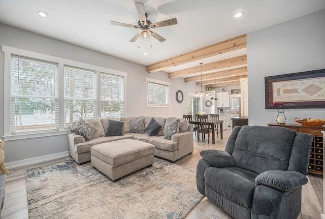 1749 Fairview Dr, Allegan, MI 49010 - living area with a ceiling fan, beamed ceiling, recessed lighting, light wood-style flooring, and baseboards