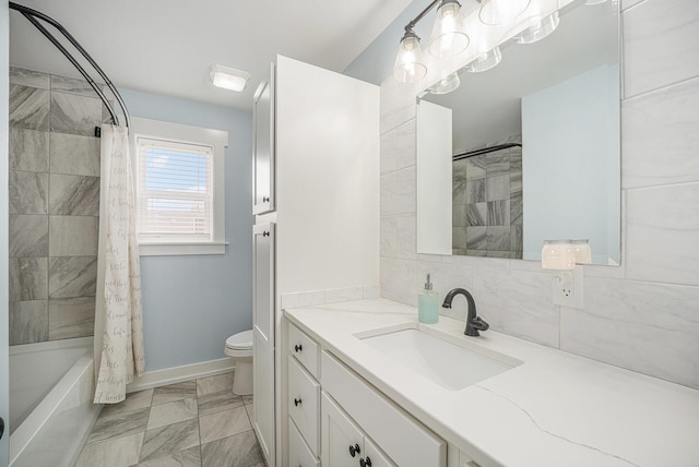 1749 Fairview Dr, Allegan, MI 49010 - bathroom with vanity, toilet, shower / bath combo with shower curtain, backsplash, and baseboards