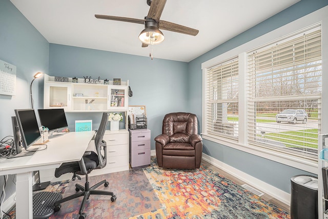 1749 Fairview Dr, Allegan, MI 49010 - home office with ceiling fan, baseboards, and wood finished floors