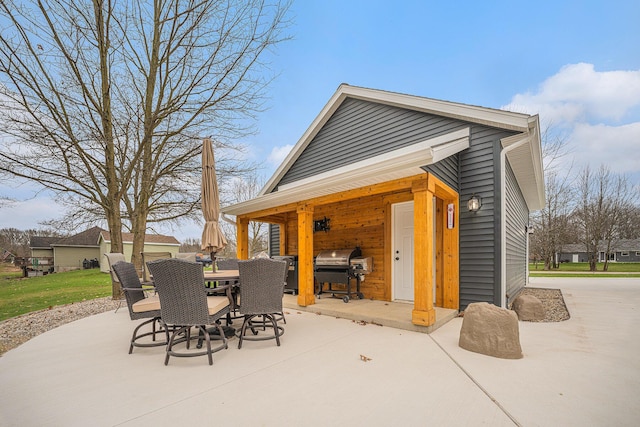 1749 Fairview Dr, Allegan, MI 49010 - view of patio featuring area for grilling and outdoor dining space