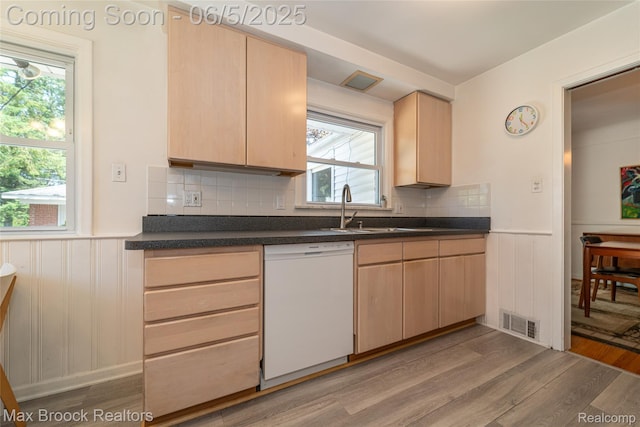 16926 Beverly Rd, Beverly Hills, MI 48025 - kitchen with white dishwasher, light brown cabinetry, light wood finished floors, wainscoting, and a sink