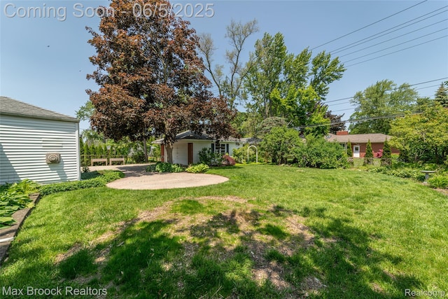 16926 Beverly Rd, Beverly Hills, MI 48025 - view of green lawn featuring a patio