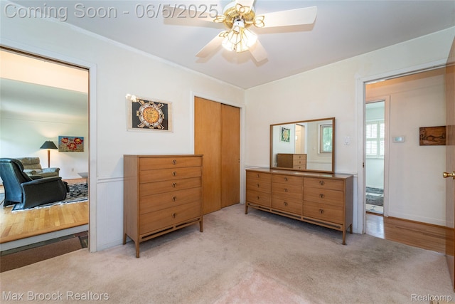16926 Beverly Rd, Beverly Hills, MI 48025 - bedroom with light carpet, a ceiling fan, and a closet
