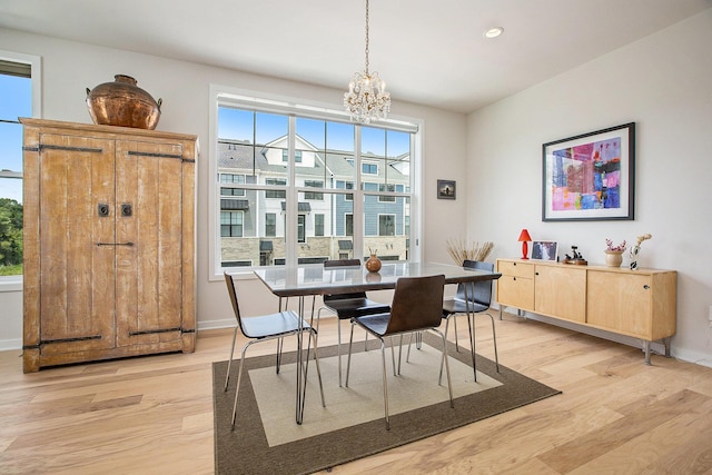 2990 Stoke Way, Ann Arbor, MI 48105 - dining area with light wood-style floors, healthy amount of natural light, a chandelier, and recessed lighting