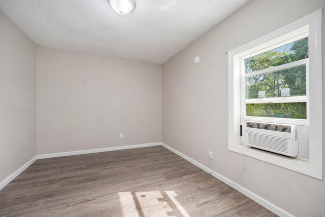 64 E Grand Circle Ave, Battle Creek, MI 49037 - spare room featuring wood finished floors and baseboards