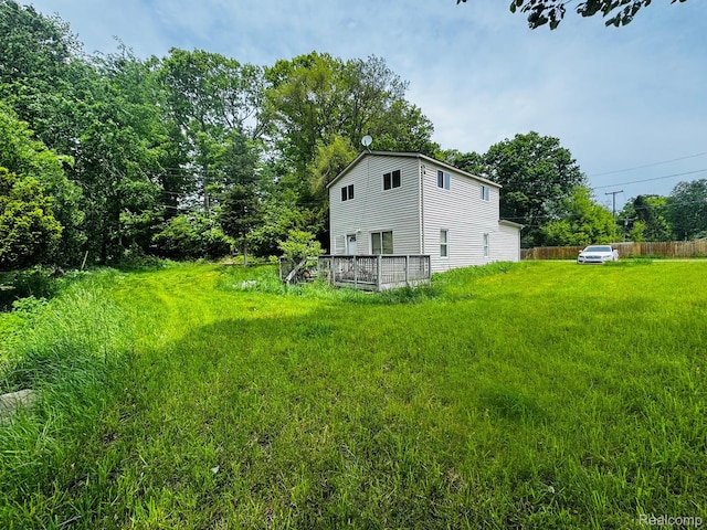 9617 Portage Trl, White Lake, MI 48386 - view of yard with a deck