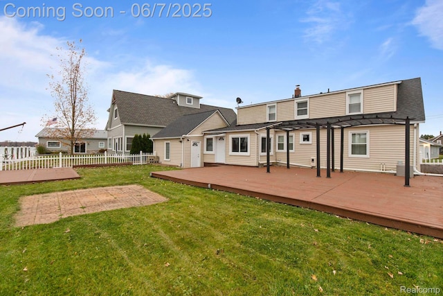 114 Interlochen Dr, Algonac, MI 48001 - back of house featuring a pergola, a wooden deck, and a chimney