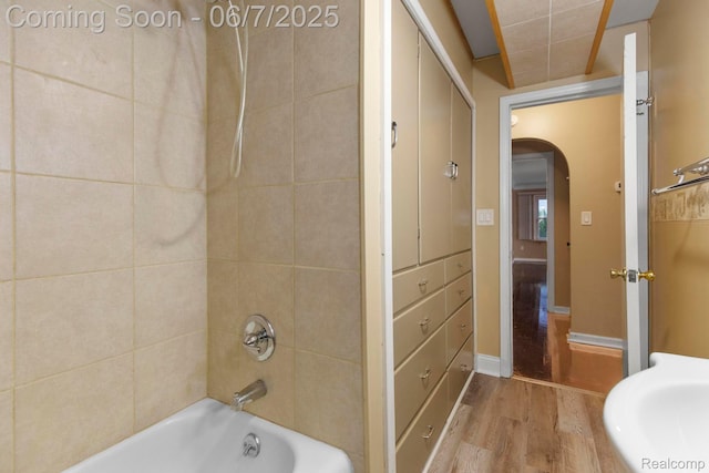 114 Interlochen Dr, Algonac, MI 48001 - bathroom with wood finished floors and tub / shower combination