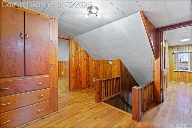 114 Interlochen Dr, Algonac, MI 48001 - bonus room featuring wooden walls, light wood-type flooring, and lofted ceiling