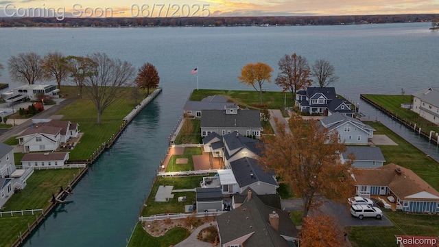 114 Interlochen Dr, Algonac, MI 48001 - aerial view at dusk of a residential view and a water view