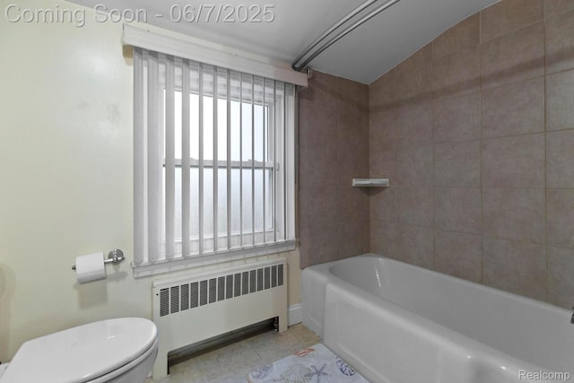 114 Interlochen Dr, Algonac, MI 48001 - full bath with radiator heating unit, toilet, and tile patterned flooring