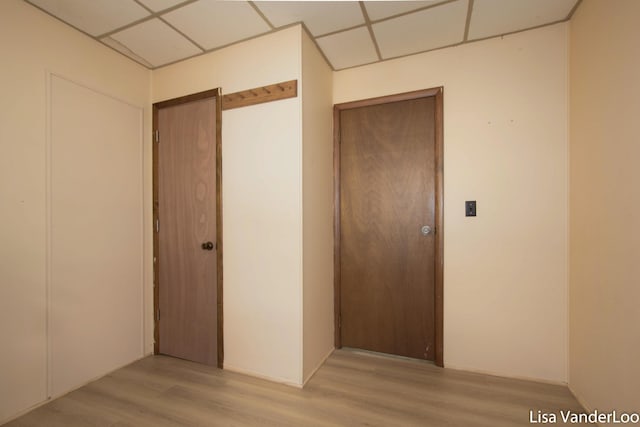 1819 Willis Ave NW, Grand Rapids, MI 49504 - hall featuring light wood-style flooring and a paneled ceiling