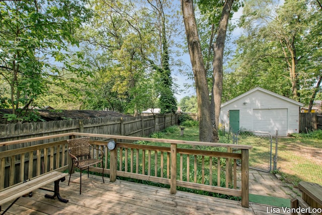 1819 Willis Ave NW, Grand Rapids, MI 49504 - wooden deck with a garage, a fenced backyard, and an outbuilding