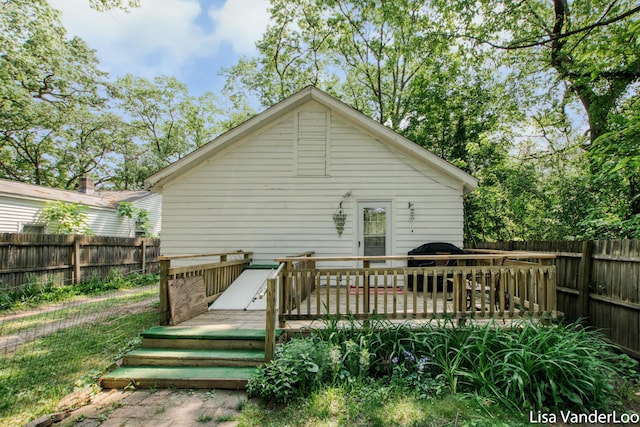 1819 Willis Ave NW, Grand Rapids, MI 49504 - back of property featuring a fenced backyard and a wooden deck