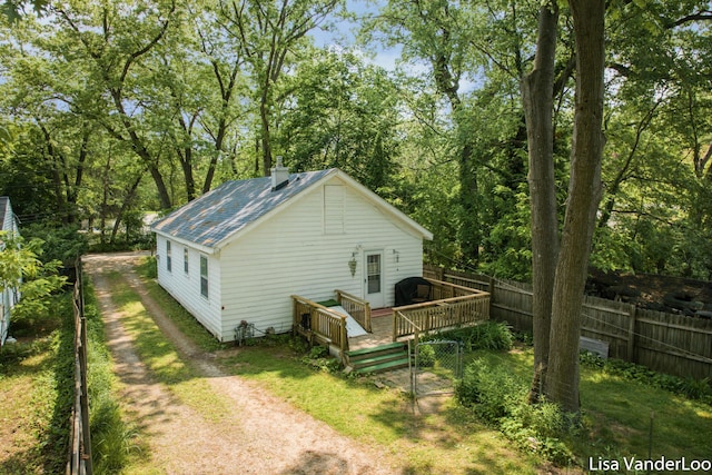 1819 Willis Ave NW, Grand Rapids, MI 49504 - rear view of property with a wooden deck