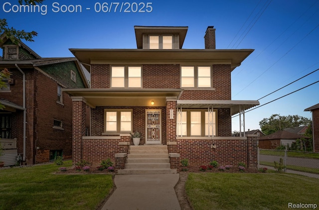 5302 Burns St, Detroit, MI 48213 - american foursquare style home with covered porch, brick siding, and a chimney