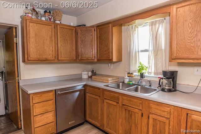 923 Stone St, Port Huron, MI 48060 - kitchen with stainless steel dishwasher, a sink, light countertops, and plenty of natural light