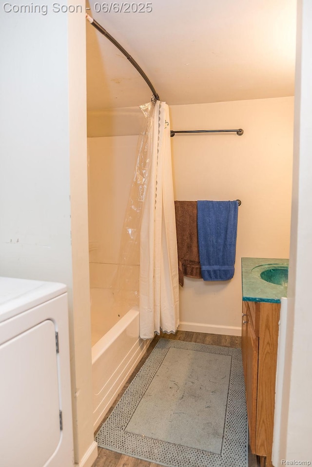 923 Stone St, Port Huron, MI 48060 - bathroom with vanity, shower / tub combo, washer / dryer, and baseboards