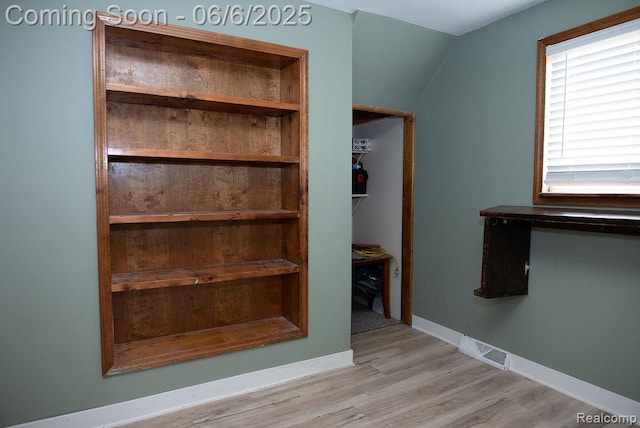 923 Stone St, Port Huron, MI 48060 - staircase featuring wood finished floors, lofted ceiling, and baseboards