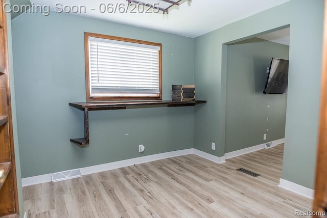923 Stone St, Port Huron, MI 48060 - spare room featuring wood finished floors and baseboards